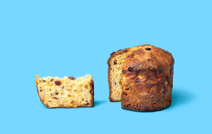Sliced panettone on a blue background