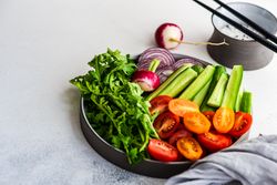 Healthy chopped vegetables with copy space