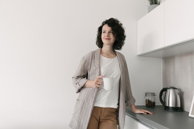 Pensive woman at home