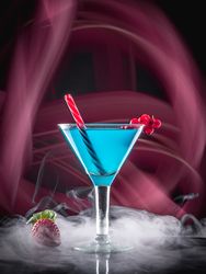 Glass with drink and berries