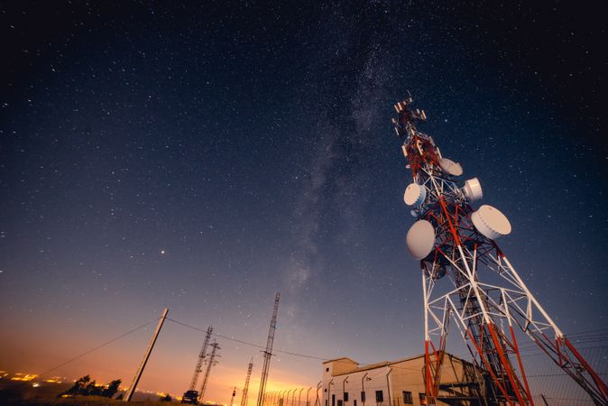 Radio tower against starry sky