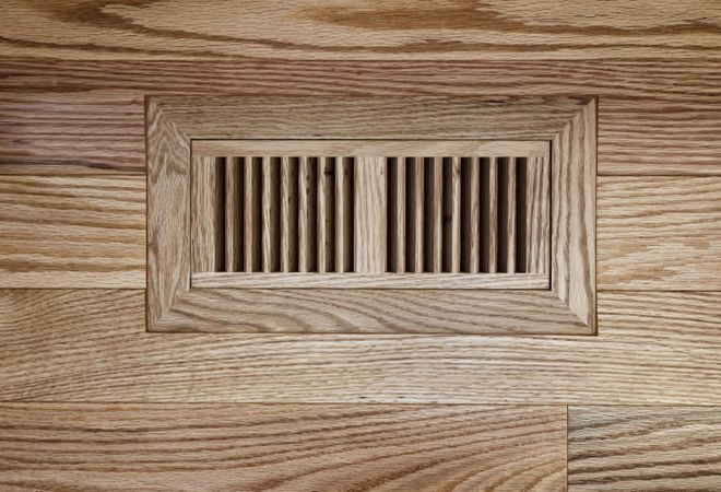 Wooden floor heater vent