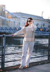 Woman enjoying view  from the waterfront