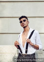 London, England, United Kingdom - September 15th, 2019: Man with open chest shirt and suspenders 5aXD80