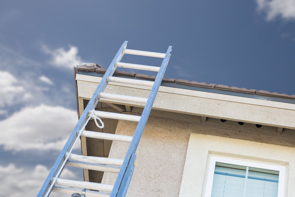 Construction Ladder Leaning Against House