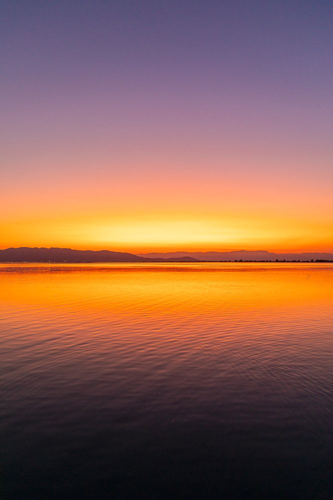 Sunset with reflections in the water