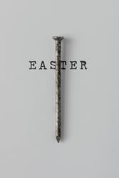Nail on light background crossed with with word “Easter”