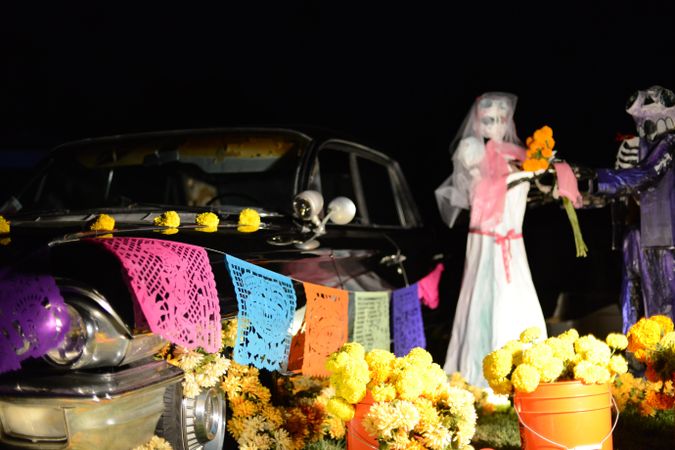 Altar at Day of the Dead event with paper picador and marigolds