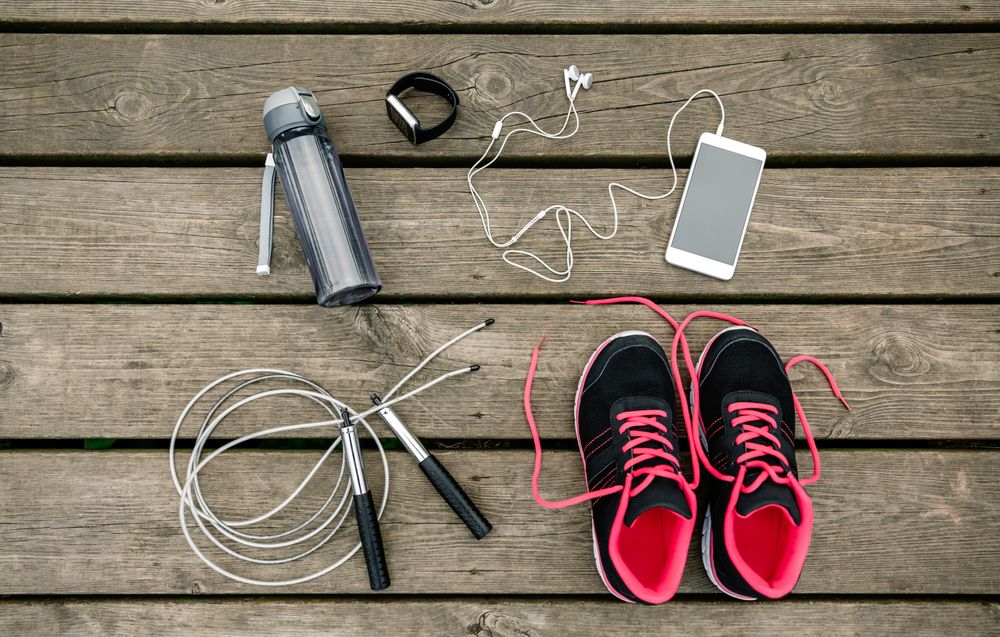 Set of sports equipment with sneakers