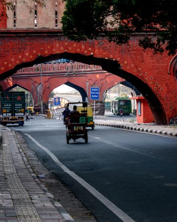 Rickshaw and other vehicles on the road in India