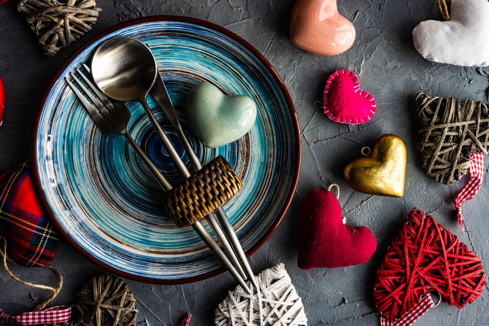 St. Valentine day table setting with colorful heart decorations