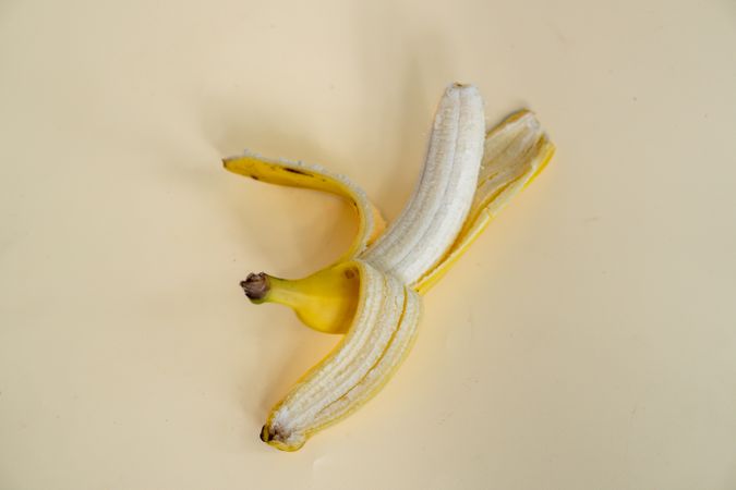 Half peeled banana