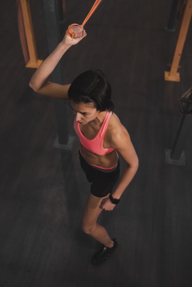 Athletic woman training in gym