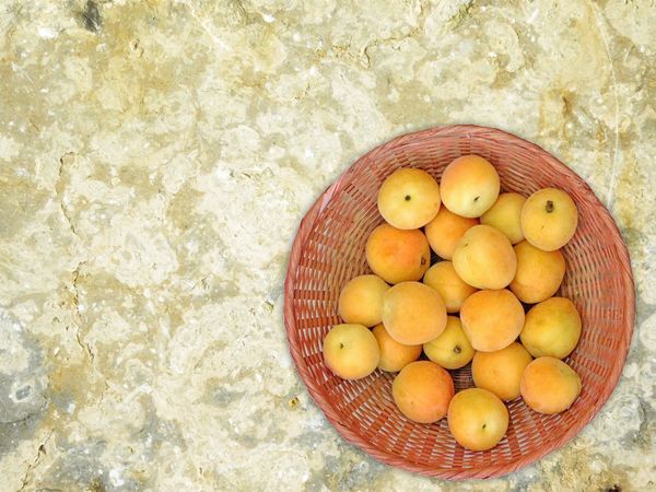 Apricots On Marble Background