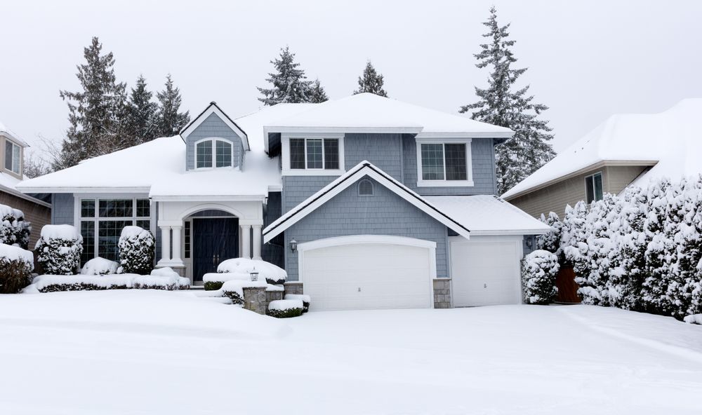 Falling snow with Pacific Northwest home