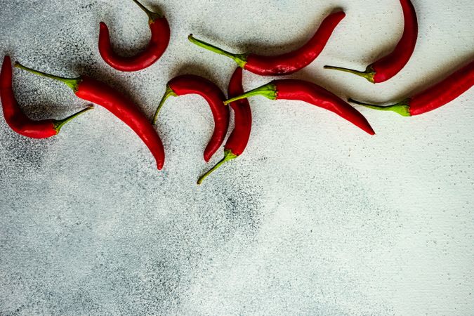 Red hot chilli pepper on concrete concrete