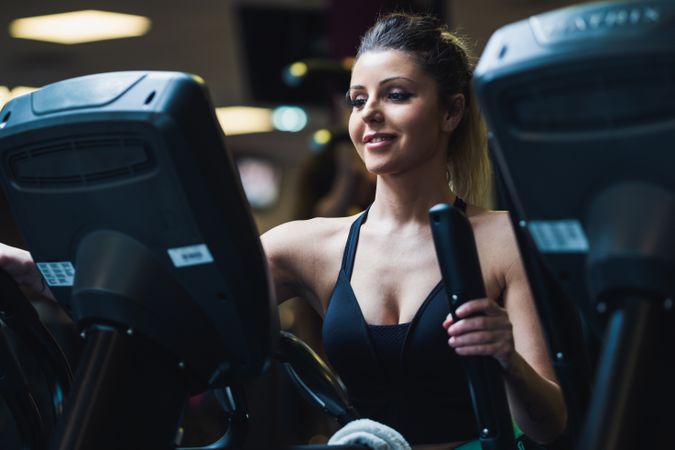woman on exercise machine