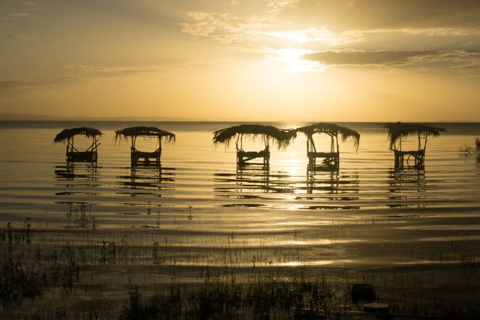Laundry in sea at sunset