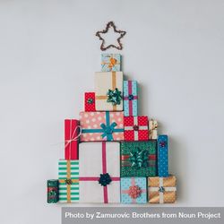 Christmas tree made of colorful presents and gifts 0KV8Zb