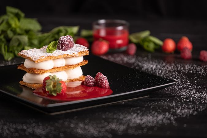 Diphlomate cream and red fruit strudel in elegant plate