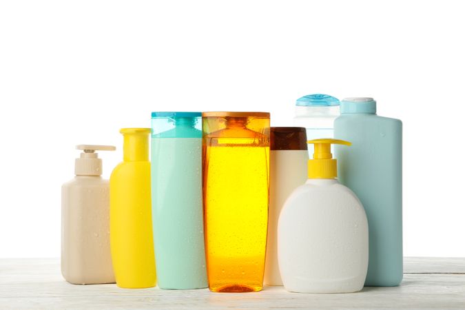 Blank bottles for cosmetics isolated on light background