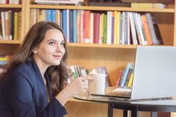 Happy businesswoman taking a break
