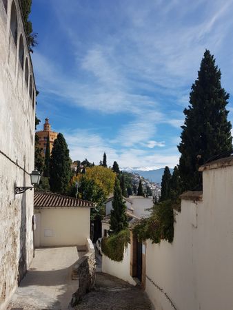 Granada street in the Realejo neighborhood with views of the Sierra Nevada