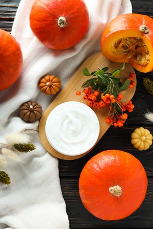Concept of different cosmetic products, Pumpkin cosmetics, top view