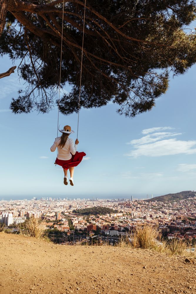 Woman having fun on a swing