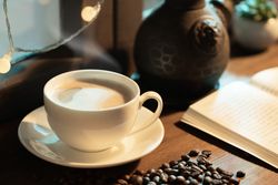 Warm Coffee Cup on Table