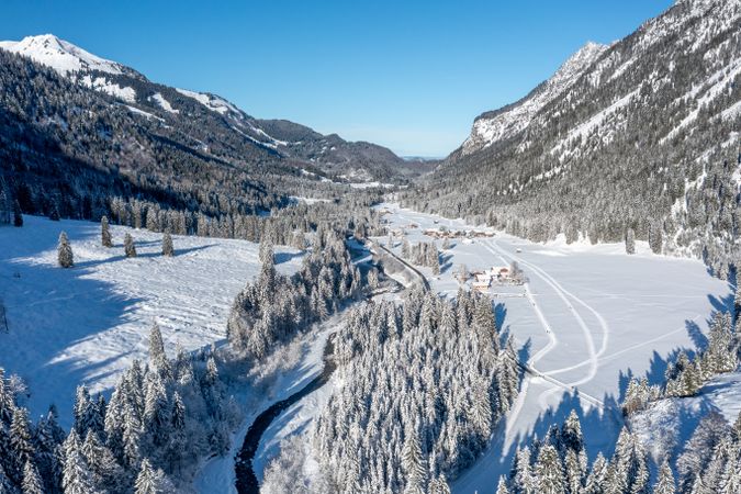 Aerial view of the snow-covered valley in between the Allgau Alps, Germany.