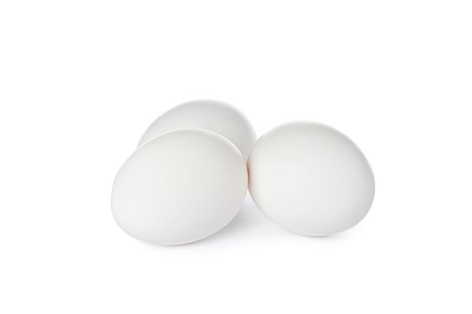 chicken eggs isolated on plain background