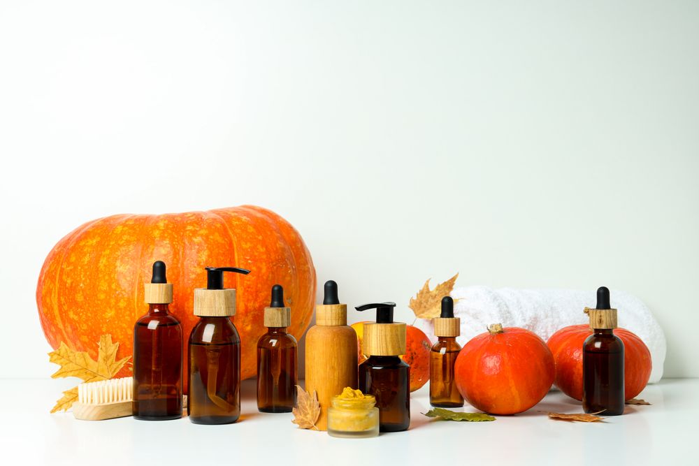 Skin care and face care concept - pumpkin cosmetic