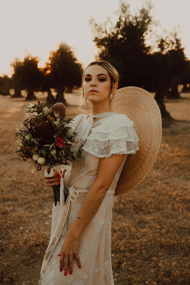 Woman in dress with flower bouquet