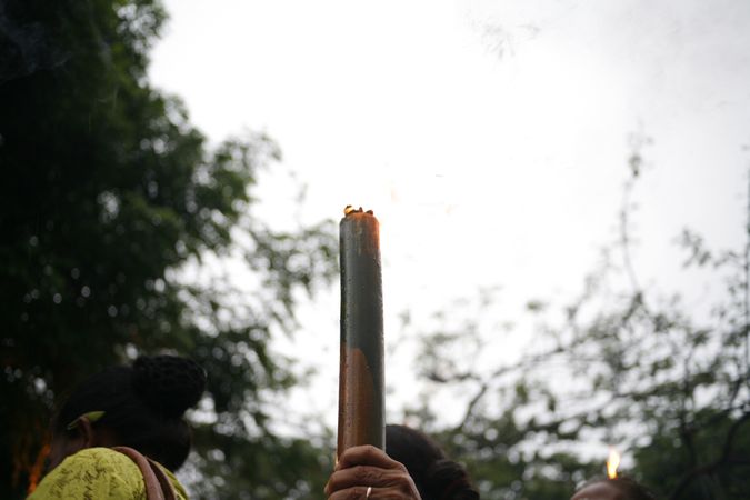 Torch for Nyepi day on overcast sky