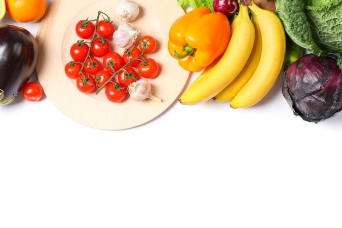 Composition with ripe vegetables and fruits isolated. Top view