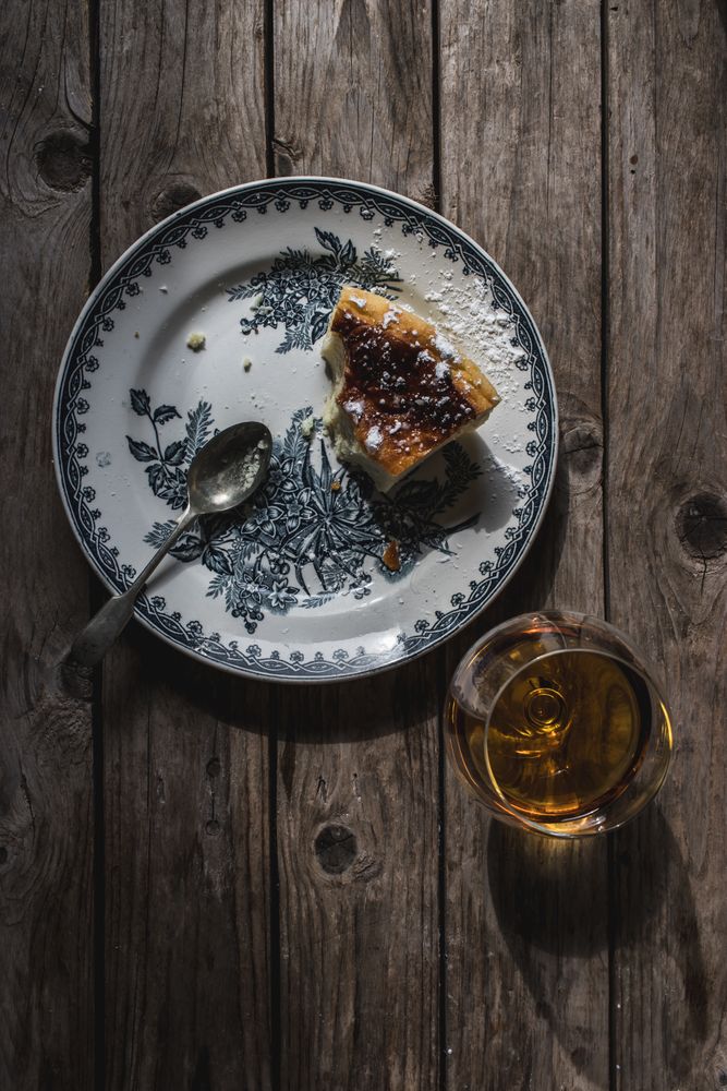 Cottage cheese pudding and glass of cognac