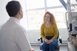 Doctor consulting with patient