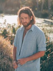 Hipster man near river