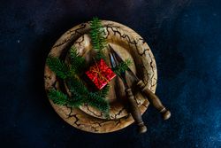 Top view of rustic Christmas table setting