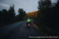 Motorcycle on mountainous road at dusk 4mO9o0