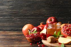 Autumnal fruits ready for baking on wooden table