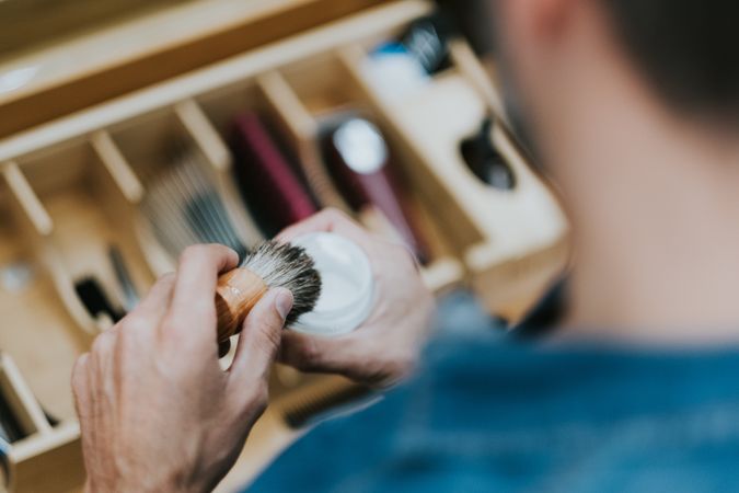 Barber with brush and shaving cream