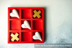 St. Valentine day card concept with heart shapes in game of tic-tac-toe 0yX6dW