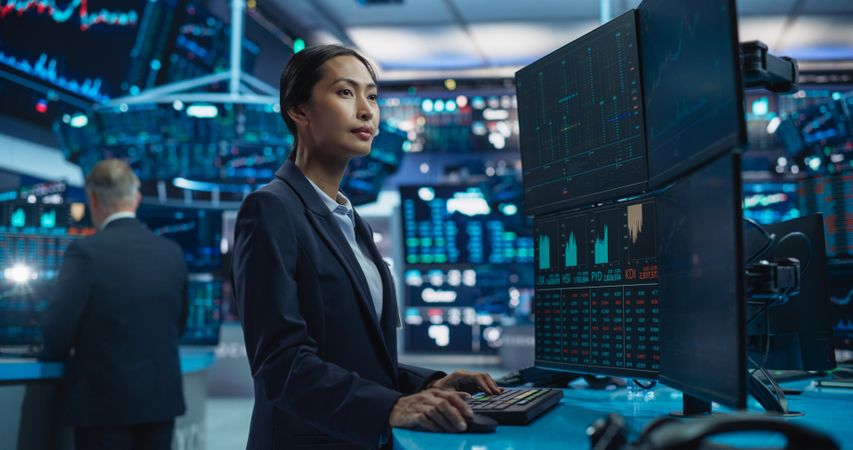 Portrait of an Asian Female Working in an International Stock Exchange