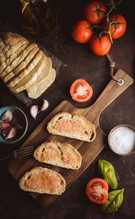 Spices and vegetables near toasts