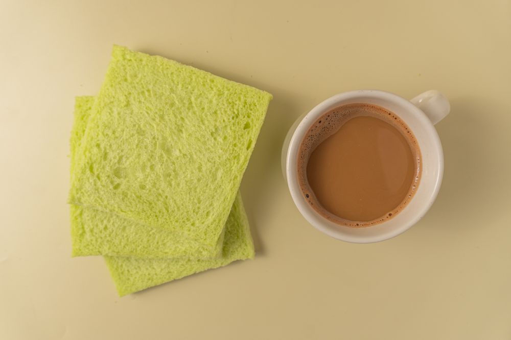 Soft pandan flavored bread and milk coffee