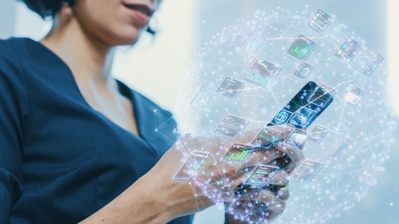 Virtual Connection Visualization Concept: Close-up of the Anonymous Businesswoman Using Smartphone.