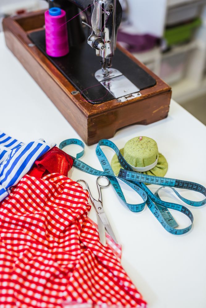 Woman in a sewing school
