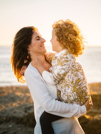 Mother with her daughter at beach
